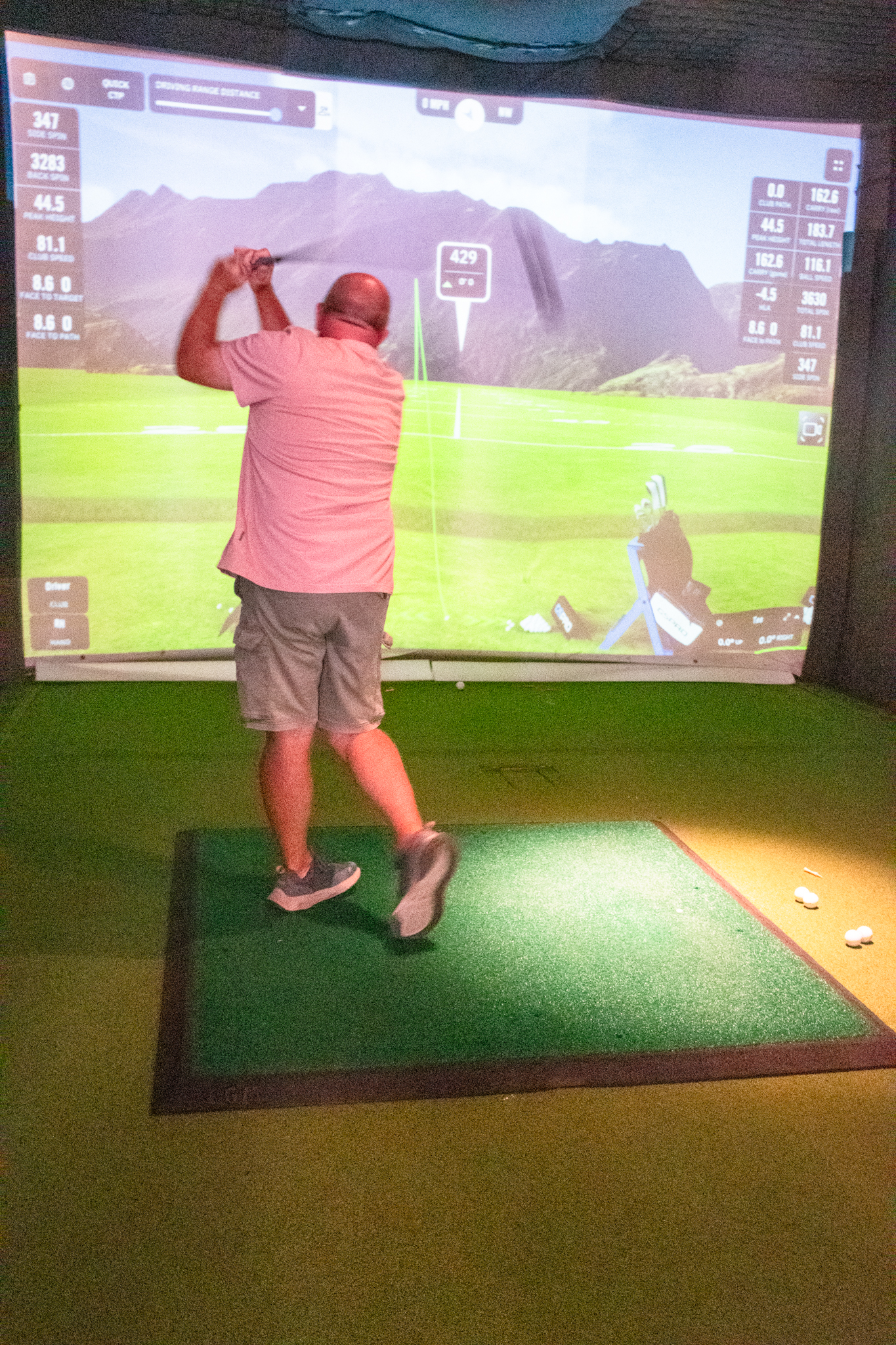 Man practising golf swing